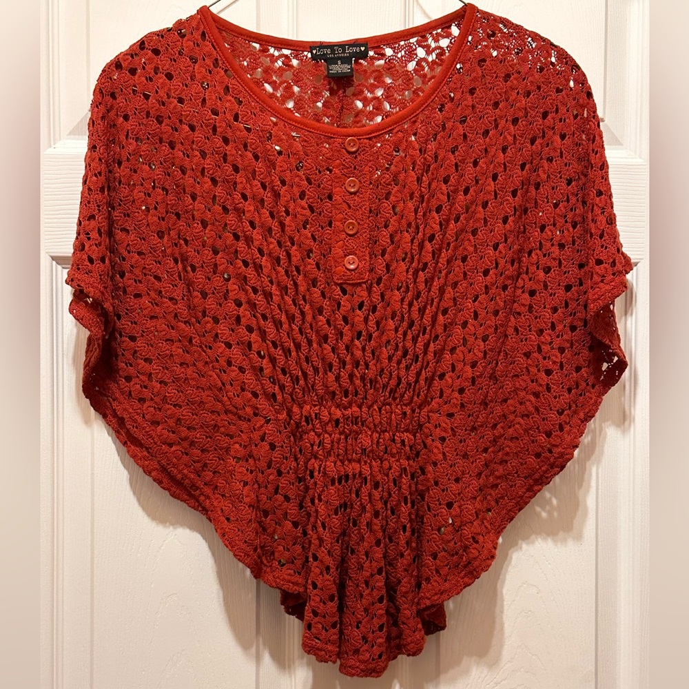 Orange net shirt. Size medium.